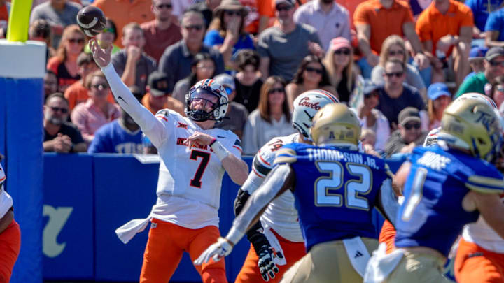 Oklahoma State quarterback Alan Bowman (7) throws the ball for a touchdown in the first half during an NCAA football game between Oklahoma State and Tulsa in Tulsa, Okla., on Saturday, Sept. 14, 2024.