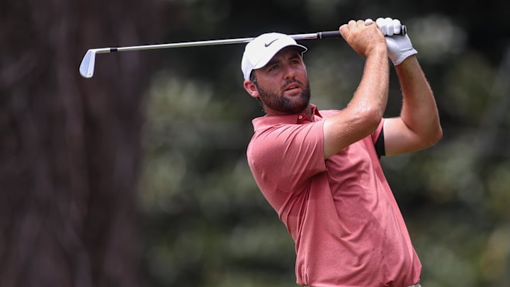 Scottie Scheffler plays his shot from the second tee during the first round of the TOUR Championship 