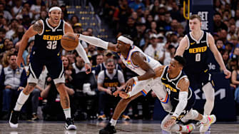 Oklahoma City Thunder guard Shai Gilgeous-Alexander (2) and Denver Nuggets guard Russell Westbrook (4) dive for a loose ball as forward Aaron Gordon (32) and guard Christian Braun (0) look on in the fourth quarter during game four of the second round of the 2025 NBA Playoffs at Ball Arena. Mandatory Credit: Isaiah J. Downing-Imagn Images