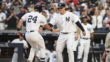 New York Yankees right fielder Matt Carpenter celebrates a home run with first baseman Anthony Rizzo.