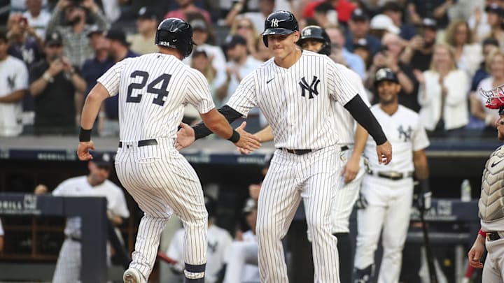 New York Yankees right fielder Matt Carpenter celebrates a home run with first baseman Anthony Rizzo.