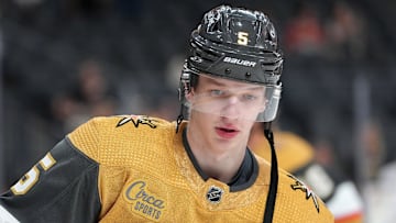 Sep 30, 2022; Las Vegas, Nevada, USA; Vegas Golden Knights defenseman Daniil Chayka (5) warms up before taking on the San Jose Sharks in a preseason game at T-Mobile Arena. Mandatory Credit: Stephen R. Sylvanie-Imagn Images