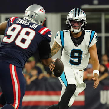 Aug 19, 2022; Foxborough, Massachusetts, USA; Carolina Panthers quarterback Matt Corral (9) runs the ball against the New England Patriots in the first half at Gillette Stadium. Mandatory Credit: David Butler II-Imagn Images