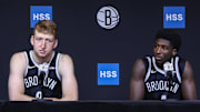 Sep 23, 2025; Brooklyn, NY, USA;  Brooklyn Nets forward Danny Wolf (2) and guard Drake Powell (4) speak at Media Day. Mandatory Credit: Wendell Cruz-Imagn Images