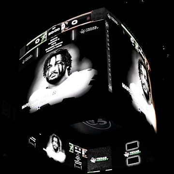 The Dallas Stars and Anaheim Ducks observe a moment of silence to in memory of Dallas Cowboys defensive end Marshawn Kneeland 