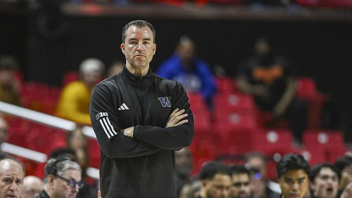 Feb 21, 2026; College Park, Maryland, USA;  Washington Huskies head coach Danny Sprinkle looks onto the court during the first half against the Maryland Terrapins at Xfinity Center. Mandatory Credit: Tommy Gilligan-Imagn Images