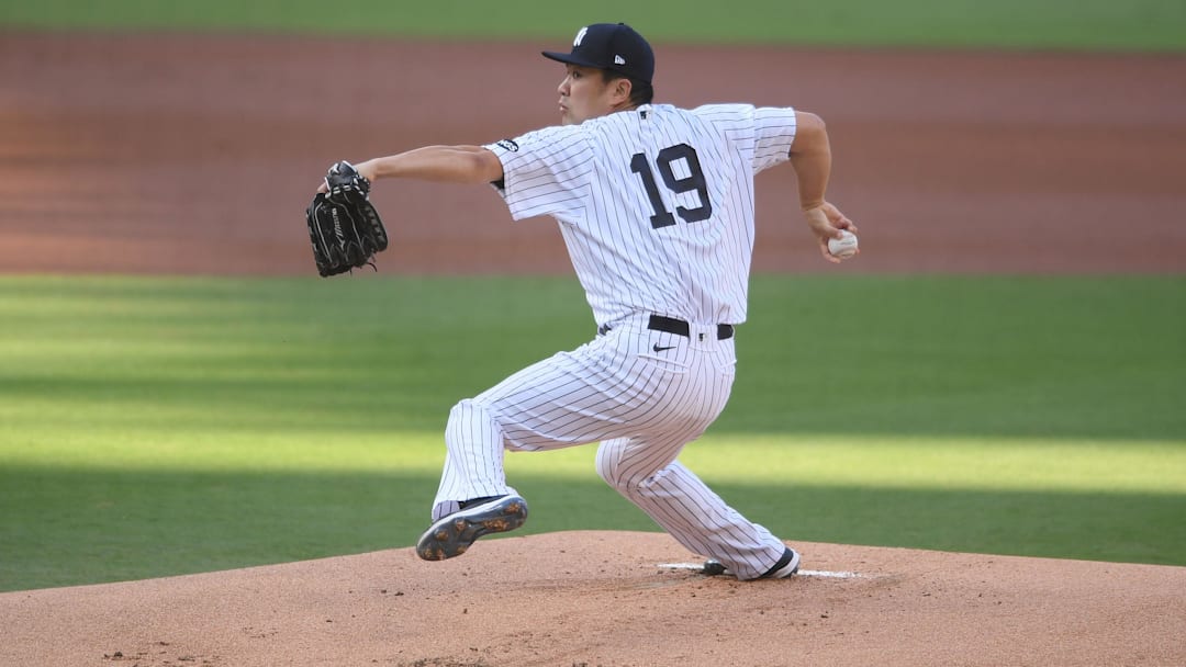 Oct 7, 2020; San Diego, California, USA; New York Yankees starting pitcher Masahiro Tanaka (19) pitches against the Tampa Bay Rays in the first inning during game three of the 2020 ALDS at Petco Park. Mandatory Credit: Orlando Ramirez-Imagn Images