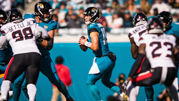 Dec 1, 2024; Jacksonville, Florida, USA; Jacksonville Jaguars quarterback Trevor Lawrence (16) drops back to pass against the Houston Texans in the first quarter at EverBank Stadium. Mandatory Credit: Jeremy Reper-Imagn Images