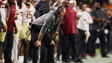 Oct 26, 2024; Miami Gardens, Florida, USA; Florida State Seminoles head coach Mike Norvell watches from the sideline against the Miami Hurricanes during the second quarter at Hard Rock Stadium. Mandatory Credit: Sam Navarro-Imagn Images