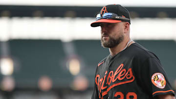 May 12, 2023; Baltimore, Maryland, USA;  Baltimore Orioles pitching coach/director of pitching Chris Holt (38) walks to the dugout before the game Pittsburgh Pirates at Oriole Park at Camden Yards. Mandatory Credit: Tommy Gilligan-Imagn Images