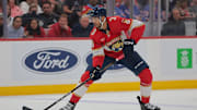 Apr 14, 2025; Sunrise, Florida, USA; Florida Panthers defenseman Seth Jones (3) moves the puck against the New York Rangers during the second period at Amerant Bank Arena. Mandatory Credit: Sam Navarro-Imagn Images