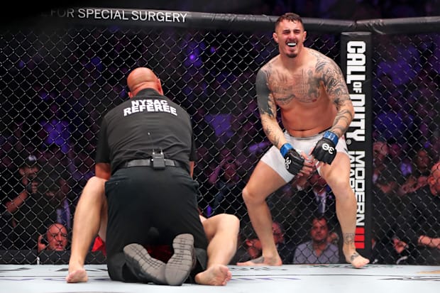 Tom Aspinall reacts to beating Sergei Pavlovich during UFC 295 at Madison Square Garden.