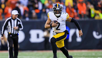 Dec 1, 2024; Cincinnati, Ohio, USA; Pittsburgh Steelers quarterback Justin Fields (2) runs with the ball against the Cincinnati Bengals in the second half at Paycor Stadium. Mandatory Credit: Katie Stratman-Imagn Images