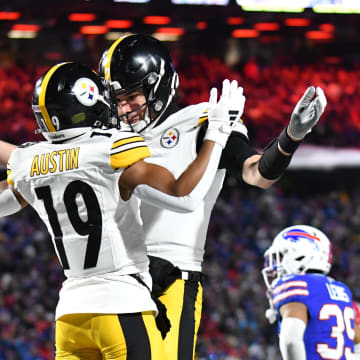 Jan 15, 2024; Orchard Park, New York, USA; Pittsburgh Steelers wide receiver Calvin Austin III (19) celebrates a touchdown in the second half against the Buffalo Bills in a 2024 AFC wild card game at Highmark Stadium. Mandatory Credit: Mark Konezny-USA TODAY Sports