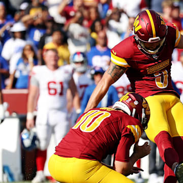 Sep 15, 2024; Landover, Maryland, USA; Washington Commanders place kicker Austin Seibert (3) kicks the game winning field goal during the fourth quarter against the New York Giants at Commanders Field. Mandatory Credit: Peter Casey-Imagn Images