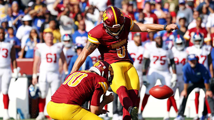 Sep 15, 2024; Landover, Maryland, USA; Washington Commanders place kicker Austin Seibert (3) kicks the game winning field goal during the fourth quarter against the New York Giants at Commanders Field. Mandatory Credit: Peter Casey-Imagn Images