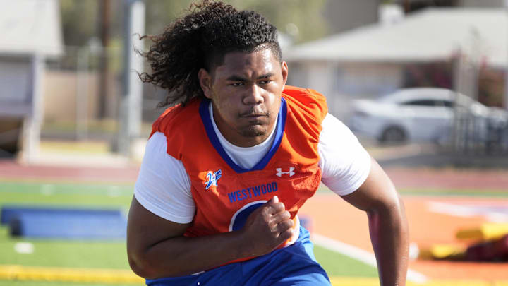 Westwood defensive end Apaiata Tengei practices during the Mesa Public Schools spring football showcase at Westwood High School football fields in Mesa on May 7, 2025. Westwood defensive end Apaiata Tengei practices during the Mesa Public Schools spring football showcase at Westwood High School football fields in Mesa on May 7, 2025.