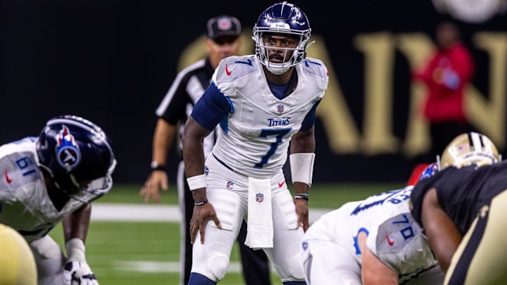 Aug 25, 2024; New Orleans, Louisiana, USA;  Tennessee Titans quarterback Malik Willis (7) looks over the New Orleans Saints defense during the second half at Caesars Superdome.