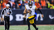 Dec 1, 2024; Cincinnati, Ohio, USA; Pittsburgh Steelers quarterback Justin Fields (2) runs with the ball against the Cincinnati Bengals in the second half at Paycor Stadium. Mandatory Credit: Katie Stratman-Imagn Images