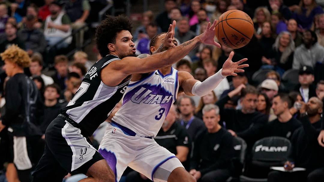Oct 12, 2026; Salt Lake City, Utah, USA; San Antonio Spurs guard Ja'Kobi Gillespie (17) steals the ball from Utah Jazz guard Keyonte George (3) during the first half at Delta Center.