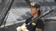 May 21, 2024; Pittsburgh, Pennsylvania, USA;  Pittsburgh Pirates center fielder Ji  Hwan Bae (3) at the batting cage before the game against the San Francisco Giants at PNC Park. Mandatory Credit: Charles LeClaire-USA TODAY Sports
