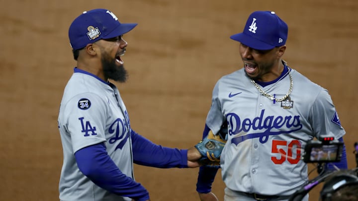 Los Angeles Dodgers shortstop Mookie Betts (50) celebrates with outfielder Teoscar Hernandez (37)