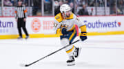Mar 30, 2024; Denver, Colorado, USA; Nashville Predators defenseman Dante Fabbro (57) skates during the second period against the Colorado Avalanche at Ball Arena. Mandatory Credit: Andrew Wevers-Imagn Images