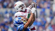 Memphis' Marcello Bussey (6) has the ball pulled out of his hands by Arkansas' Julian Neal (23) during the game between Memphis and Arkansas at Simmons Bank Liberty Stadium in Memphis, Tenn., on September 20, 2025.