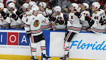 Oct 23, 2025; Tampa, Florida, USA; Chicago Blackhawks center Ryan Donato (8) is congratulated after he scored a goal against the Tampa Bay Lightning  during the third period at Benchmark International Arena. Mandatory Credit: Kim Klement Neitzel-Imagn Images
