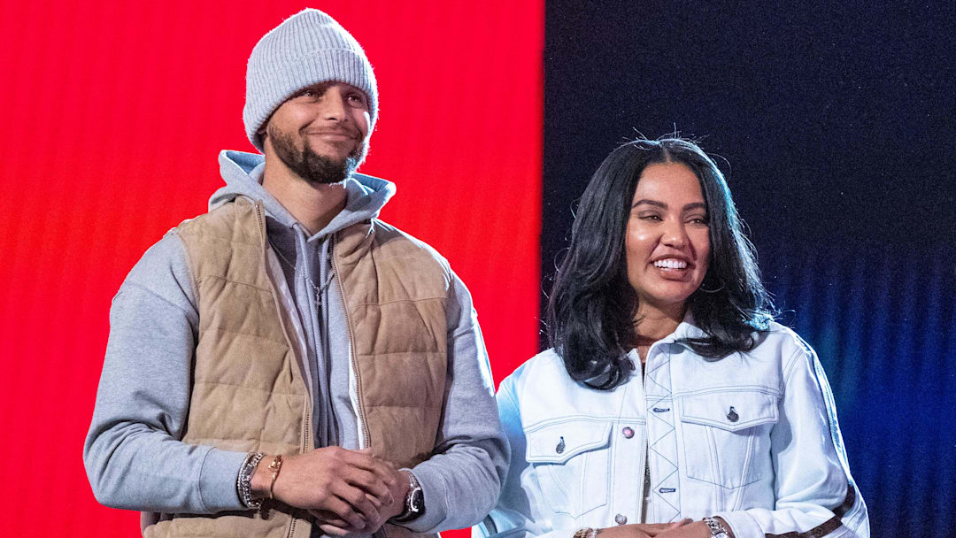 February 19, 2022; Cleveland, OH, USA; Golden State Warriors guard Stephen Curry (30) and wife Ayesha Curry (right) during the 2022 NBA All-Star Saturday Night at Rocket Mortgage Field House. 