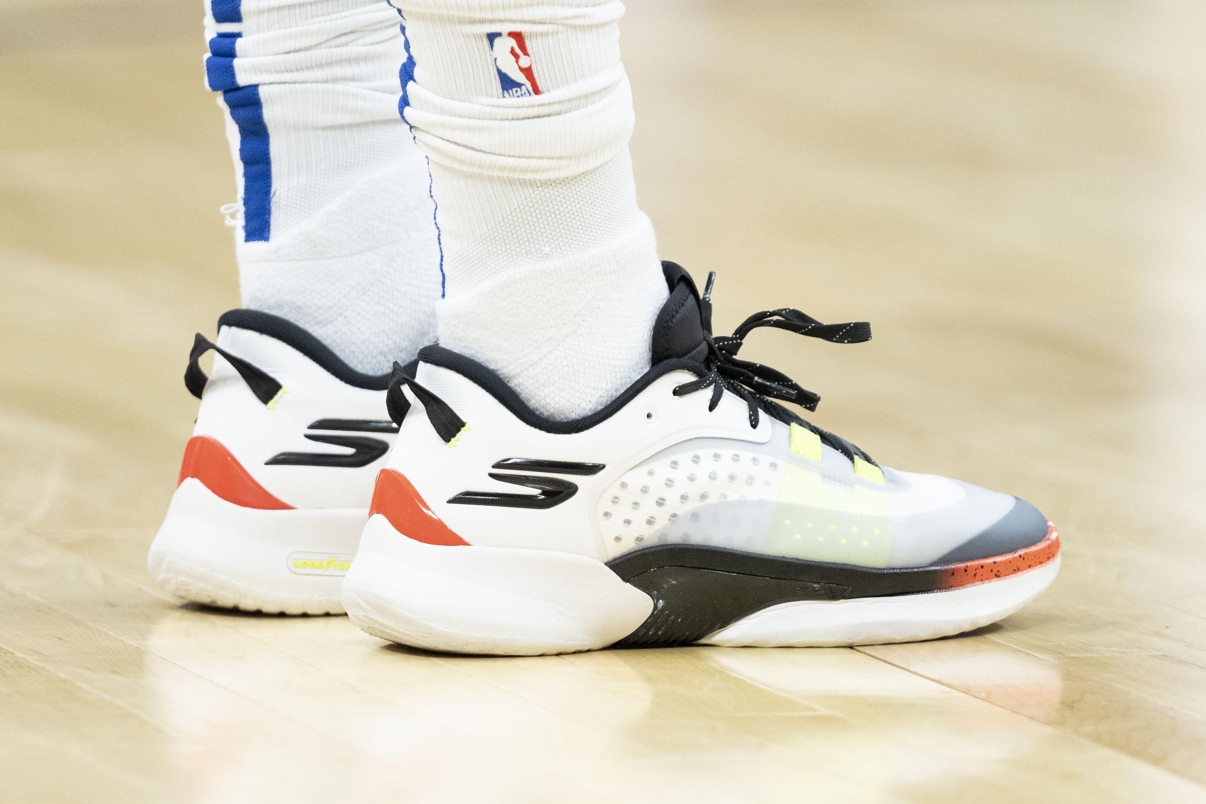 LA Clippers guard Terance Mann's white and black Skechers sneakers.