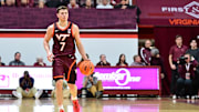 Feb 15, 2025; Blacksburg, Virginia, USA;  Virginia Tech Hokies guard Brandon Rechsteiner (7) controls the ball .during the first half against the Virginia Cavaliers at Cassell Coliseum. Mandatory Credit: Brian Bishop-Imagn Images
