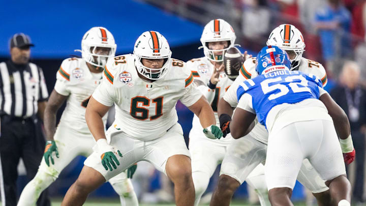 Jan 8, 2026; Glendale, AZ, USA; Miami Hurricanes offensive lineman Francis Mauigoa (61) against the Mississippi Rebels during the 2026 Fiesta Bowl and semifinal game of the College Football Playoff at State Farm Stadium. Mandatory Credit: Mark J. Rebilas-Imagn Images