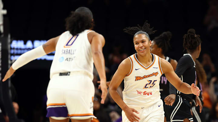 May 11, 2025; Phoenix, AZ, USA; Phoenix Mercury forward Alyssa Thomas (25) celebrates a play with Satou Sabally (0) against the Golden State Valkyries during a preseason game at PHX Arena. Mandatory Credit: Mark J. Rebilas-Imagn Images