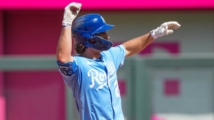 Aug 17, 2025; Kansas City, Missouri, USA; Kansas City Royals left fielder Adam Frazier (26) celebrates after hitting a double against the Chicago White Sox in the seventh inning at Kauffman Stadium. Mandatory Credit: Denny Medley-Imagn Images