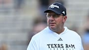 Oct 4, 2025; College Station, Texas, USA; Texas A&M Aggies head coach Mike Elko looks on prior to the game against the Mississippi State Bulldogs at Kyle Field. Mandatory Credit: Maria Lysaker-Imagn Images 