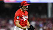 Sep 23, 2025; Cincinnati, Ohio, USA; Cincinnati Reds relief pitcher Connor Phillips (34) reacts after a play in the sixth inning against the Pittsburgh Pirates at Great American Ball Park. Mandatory Credit: Katie Stratman-Imagn Images