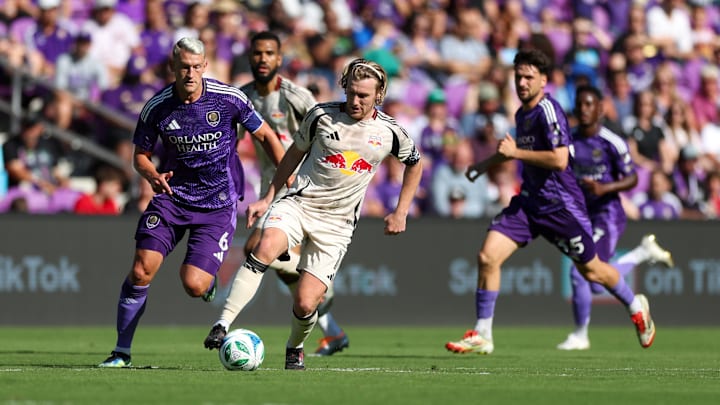 Apr 12, 2025; Orlando, Florida, USA; New York Red Bulls midfielder Emil Forsberg (10) controls the ball against Orlando City in the first half at Inter&Co Stadium. Mandatory Credit: Nathan Ray Seebeck-Imagn Images