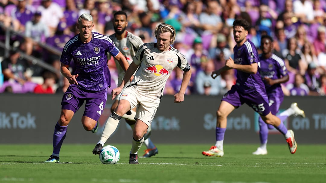 Apr 12, 2025; Orlando, Florida, USA; New York Red Bulls midfielder Emil Forsberg (10) controls the ball against Orlando City in the first half at Inter&Co Stadium. Mandatory Credit: Nathan Ray Seebeck-Imagn Images