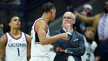 Dec 4, 2024; Storrs, Connecticut, USA; UConn Huskies head coach Dan Hurley talks with forward Jayden Ross (23) from the sideline as they take on the Baylor Bears at Harry A. Gampel Pavilion. Mandatory Credit: David Butler II-Imagn Images