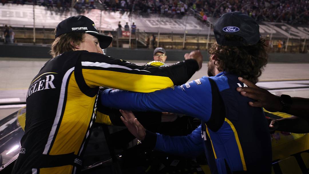 Carson Hocevar, driver of the #77 Zeigler Auto Group Chevrolet, (L) and Ryan Blaney, driver of the #12 WABASH Ford, get into an altercation after the NASCAR Cup Series Bass Pro Shops Night Race at Bristol Motor Speedway on September 19, 2026 in Bristol, Tennessee. Carson Hocevar, driver of the #77 Zeigler Auto Group Chevrolet, (L) and Ryan Blaney, driver of the #12 WABASH Ford, get into an altercation after the NASCAR Cup Series Bass Pro Shops Night Race at Bristol Motor Speedway on September 19, 2026 in Bristol, Tennessee.