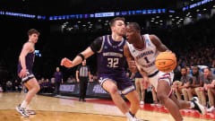 Florida Atlantic guard Johnell Davis drives against Northwestern.