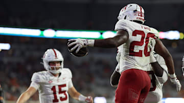 Sep 20, 2025; Charlottesville, Virginia, USA; Stanford Cardinal running back Micah Ford (20) celebrates with teammates after scoring a touchdown against the Virginia Cavaliers during the second quarter at Scott Stadium. Mandatory Credit: Geoff Burke-Imagn Images