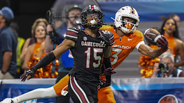 Aug 31, 2025; Atlanta, Georgia, USA; Virginia Tech Hokies wide receiver Donavon Greene (3) tries to make a one handed catch behind South Carolina Gamecocks defensive back Brandon Cisse (15) during the second half at Mercedes-Benz Stadium. Mandatory Credit: Dale Zanine-Imagn Images