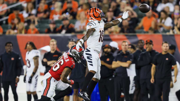 Cincinnati Bengals wide receiver Kwamie Lassiter II (18) attempts to catch a pass against the Tampa Bay Buccaneers 