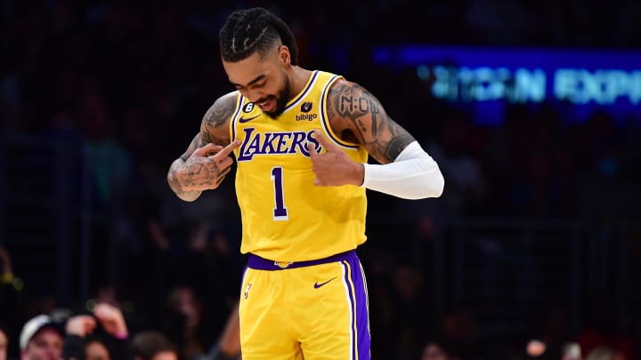 Feb 15, 2023; Los Angeles, California, USA; Los Angeles Lakers guard D'Angelo Russell (1) reacts after scoring a three point basket against the New Orleans Pelicans during the second half at Crypto.com Arena. Mandatory Credit: Gary A. Vasquez-USA TODAY Sports