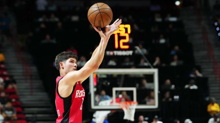 Jul 14, 2024; Las Vegas, NV, USA; Houston Rockets guard Reed Sheppard (15) shoots against the Washington Wizards during the third quarter at Thomas & Mack Center. Mandatory Credit: Stephen R. Sylvanie-USA TODAY Sports