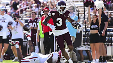 Oct 26, 2024; Starkville, Mississippi, USA; Mississippi State Bulldogs wide receiver Kevin Coleman Jr. (3) runs for a touchdown while defended by Arkansas Razorbacks defensive back Doneiko Slaughter (3) during the third quarter at Davis Wade Stadium at Scott Field. Mandatory Credit: Matt Bush-Imagn Images