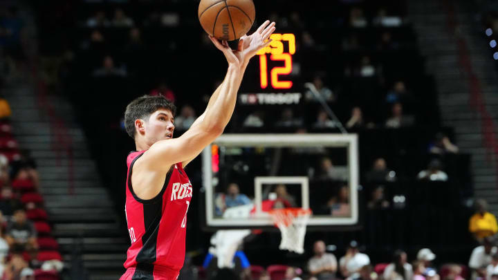 Jul 14, 2024; Las Vegas, NV, USA; Houston Rockets guard Reed Sheppard (15) shoots against the Washington Wizards during the third quarter at Thomas & Mack Center. Mandatory Credit: Stephen R. Sylvanie-USA TODAY Sports