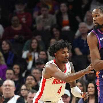 Feb 29, 2024; Phoenix, Arizona, USA; Houston Rockets guard Jalen Green (4) guards Phoenix Suns forward Kevin Durant (35) during the first half at Footprint Center. Mandatory Credit: Joe Camporeale-Imagn Images